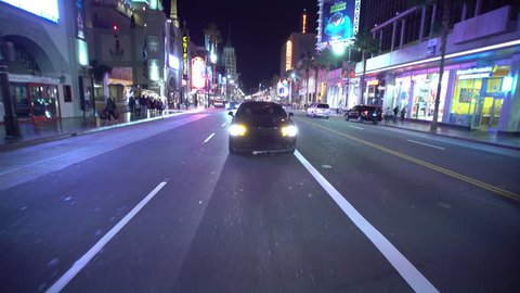 Los Angeles - CIRCA 2016 : Driving Plates Hollywood Blvd Night Rear View 04 West bound at Highland Ave