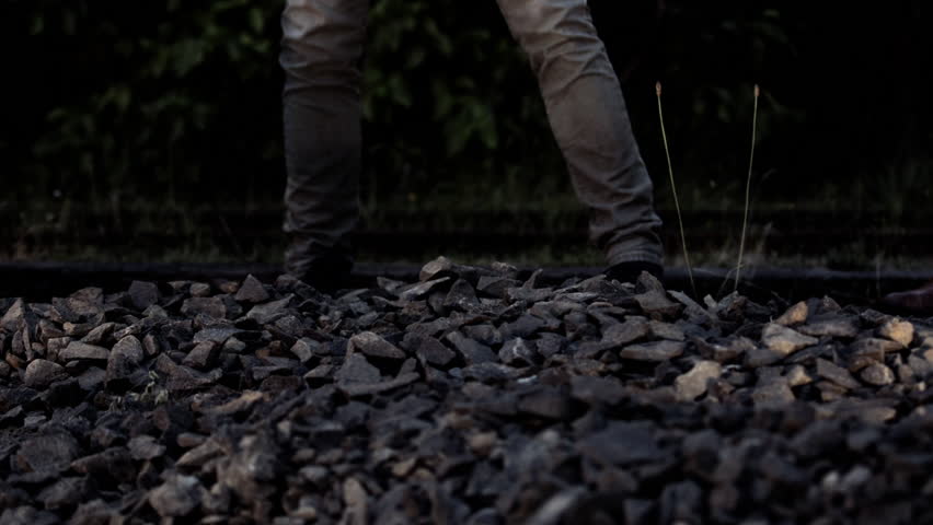 Workers hitting rocks at night - wide and tight shots