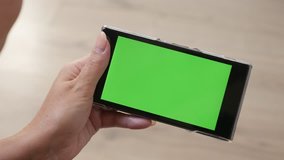 Green screen tablet display with female at home 4K 2160p 30fps UltraHD footage - Close-up of woman and greenscreen smart phone in hands 3840X2160 UHD video