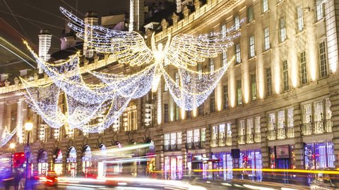 London, UK - 23.11.2016: Hyper-Lapse at the curve of Regent Street at the Piccadilly Circus, London. Time-Lapse, night, Christmas decoration. Long shutter speed, wide angle.