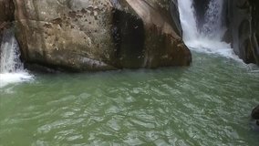 Slow Motion Video of a Picturesque Waterfall in the Mountains of Asia, Vietnam