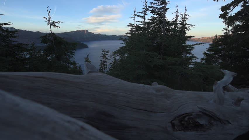 Crater Lake National Park Oregon at Sunset Wizard Island and Watchman Peak in the background slow camera dolly