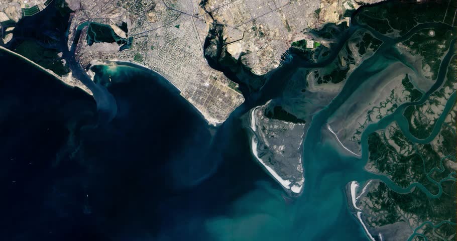 High-altitude overflight aerial of Karachi, Pakistan. Clip loops and is reversible. Elements of this image furnished by NASA 