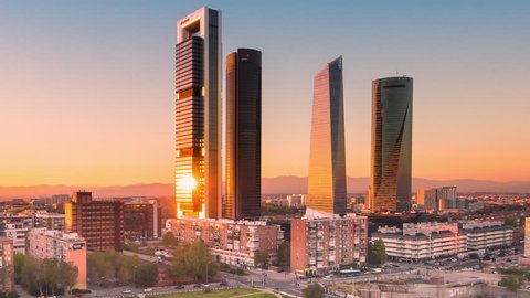 madrid skyline cityscape four towers financial center timelapse from day to night