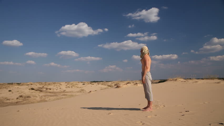 A man stands in the desert