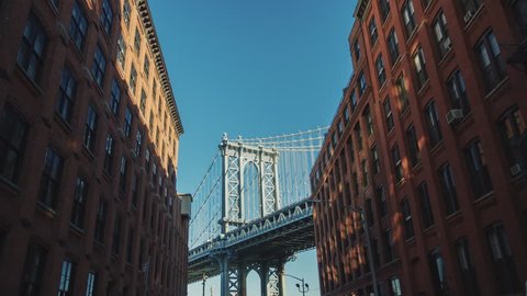 Manhattan Bridge Motion Timelapse. The camera moves to the famous bridge from Brooklyn. You can key sky for your background