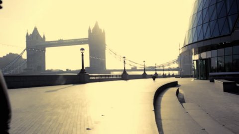 Runner on steps City hall London,Tower bridge in background Stock Video