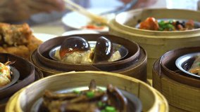 Chinese traditional food, steamed dim sum, yum cha in bamboo tray