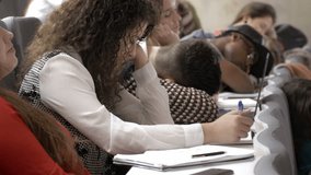 Many tired young people sleeping in the lecture hall during a boring presentation. All students snoozing in a boring university lecture. - Powered by Shutterstock - Get 15% off with code: PIKWIZARD15