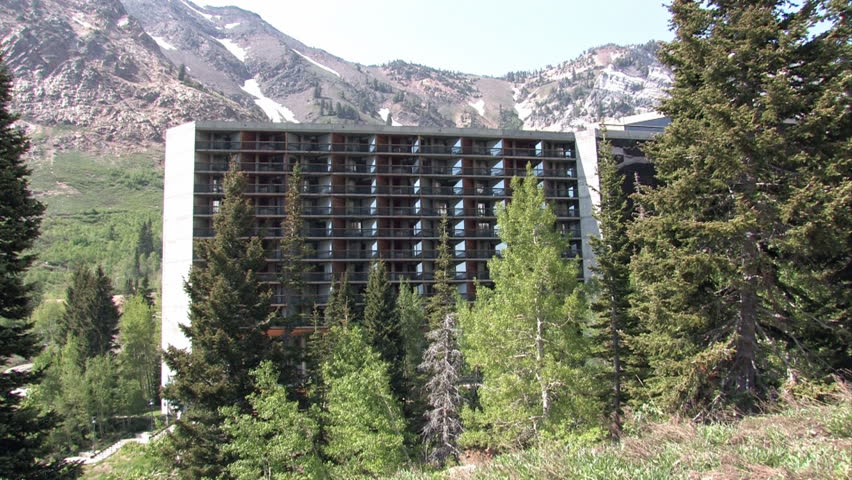 Timeshare hotel resort high Wasatch Mountain valley of Alta and Snowbird Utah.  Rugged high cliffs and forests Salt lake City, Utah. Luxury residence hotel and resorts for the rich and famous. 