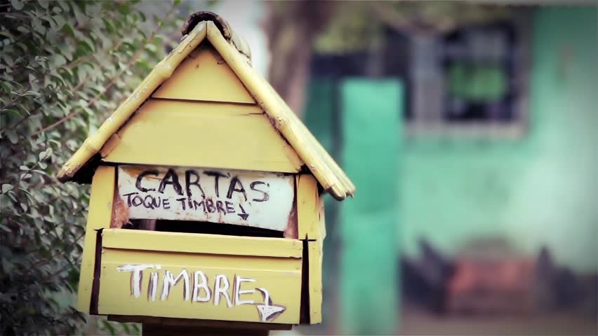 Rustic Mailbox With Handwritten Sign in Spanish, Local Neighborhood Detail