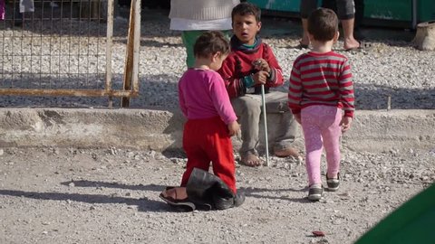 LESVOS, GREECE - NOV 5, 2015: Refugee children at the port of Mytilene.