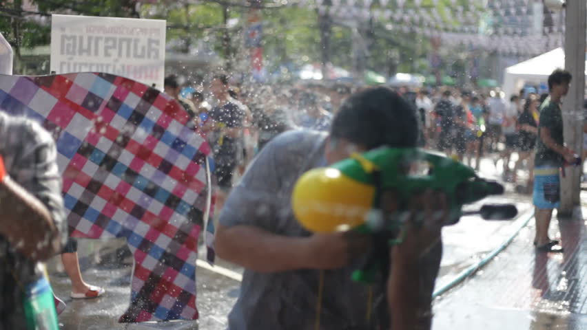 BANGKOK - APRIL 14, 2012: Thai people are celebrating Songkran Water Festival at