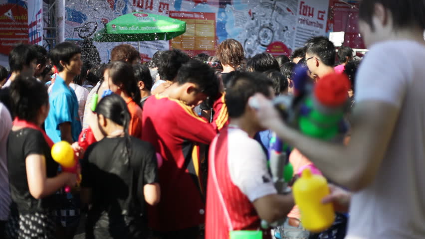 BANGKOK - APRIL 14, 2012: Thai people are celebrating Songkran Water Festival at