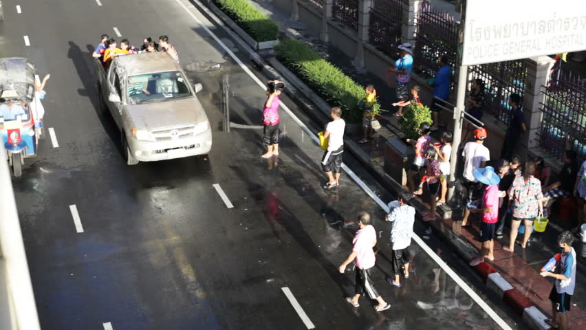 BANGKOK - APRIL 15, 2012: Thai People are celebrating Songkran Water Festival in