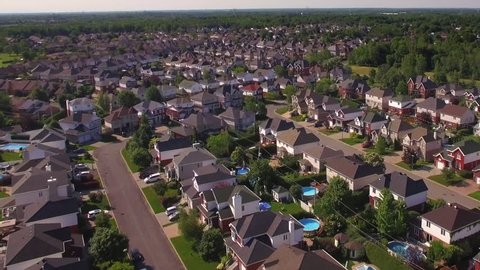 Aerial view of residential neighbourhood in the suburbs of Montreal at sunset in Quebec, Canada.