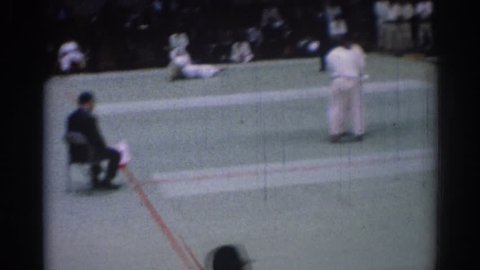 LOS ANGELES CALIFORNIA 1967: karate competition in a gymnasium.