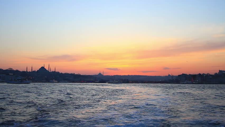 Cruise ship sailing out Istanbul on beautiful sunset
