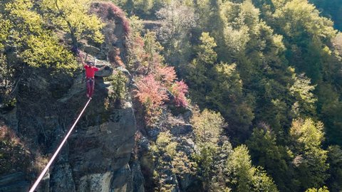 Brave Man Slacklining Above Autumn Trees Season Nature Danger Adventure Leisure Sport Mountain Balance Extreme Hiker Walking Happy