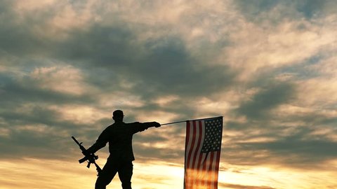 
silhouette of Soldier with automatic rifle wave American Flag .Slow Motion. 
