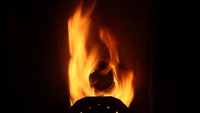 Pellet stove burn pot area hole
