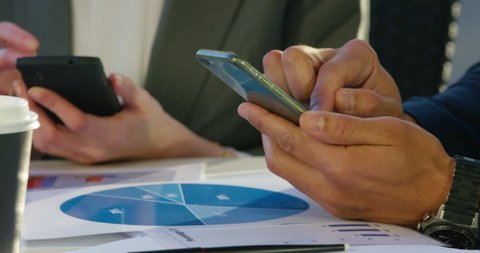 4K Cinemagraph: Close Up Of Businessman Hand Typing Text Message On Mobile Video stock