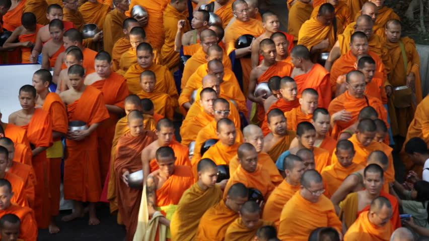 BANGKOK, MARCH 17, 2012: Monks are participating in a Mass Alms Giving of 12,600