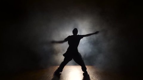 Man dancing in the dark.