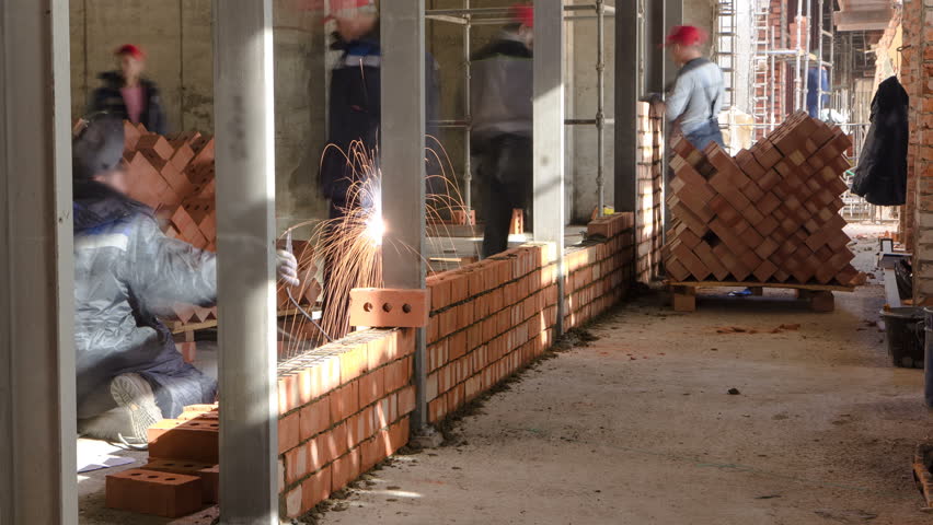 Bricklayer Construction Worker Installing Red Brick Masonry on Exterior ...