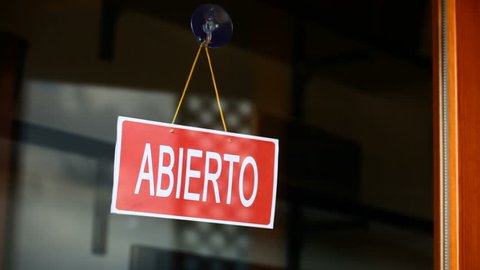 Open and closed signs (espanol)