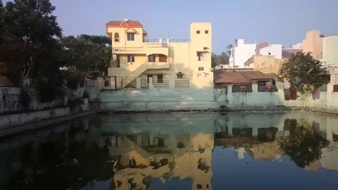 Urban Pastel Villa (detached house) on waterfront. Beautiful reflection (mirroring) in water. India