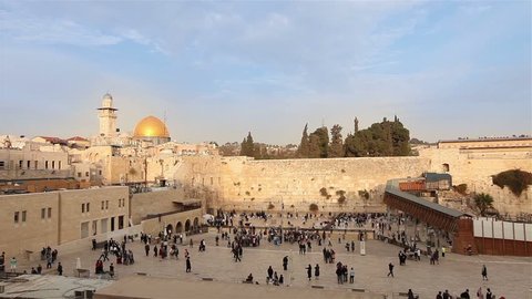 Jerusalem, Western Wall and Dome of the Rock, Sunny day,  blue sky, clouds, people in the area, Israel flag, general plan, Timelapse, top shooting, zoom