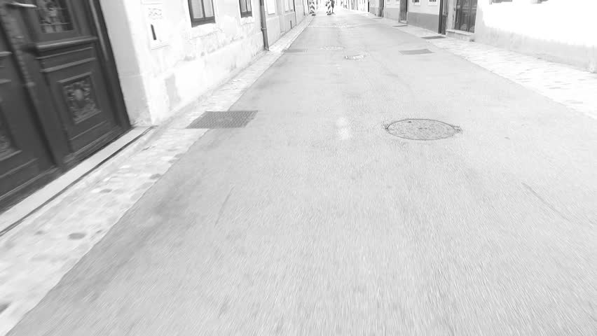 Unknown male walking on the street.