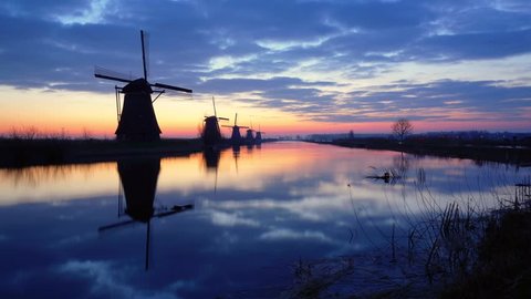 Timelapse of a sunrise at the famous mills of Kinderdijk / Netherlands