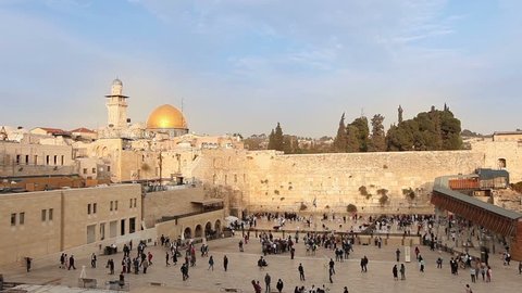  Israel, Jerusalem western wall. The Western Wall,  Wailing Wall, Jewish shrine, old city of Jerusalem, Orthodox Jews pray, religion, Timelapse, zoom, panorama