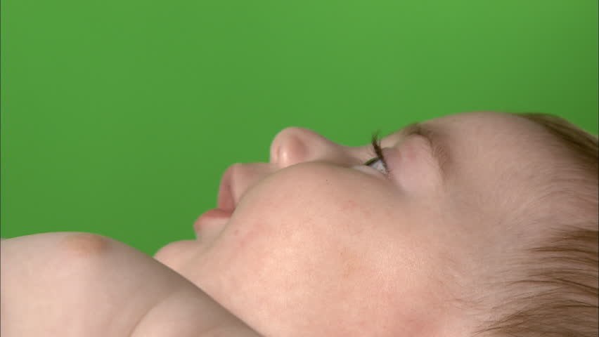 Green screen closeup of baby's face