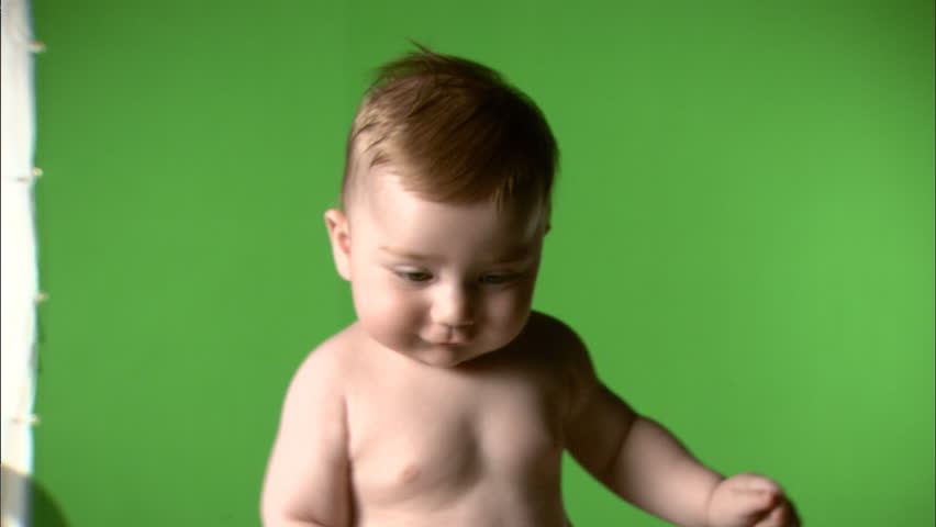 Green screen of standing baby boy