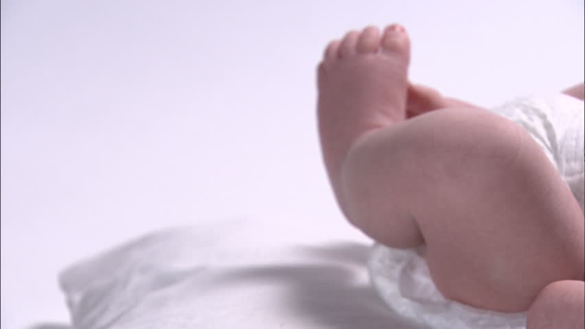 Side view of newborn baby's body