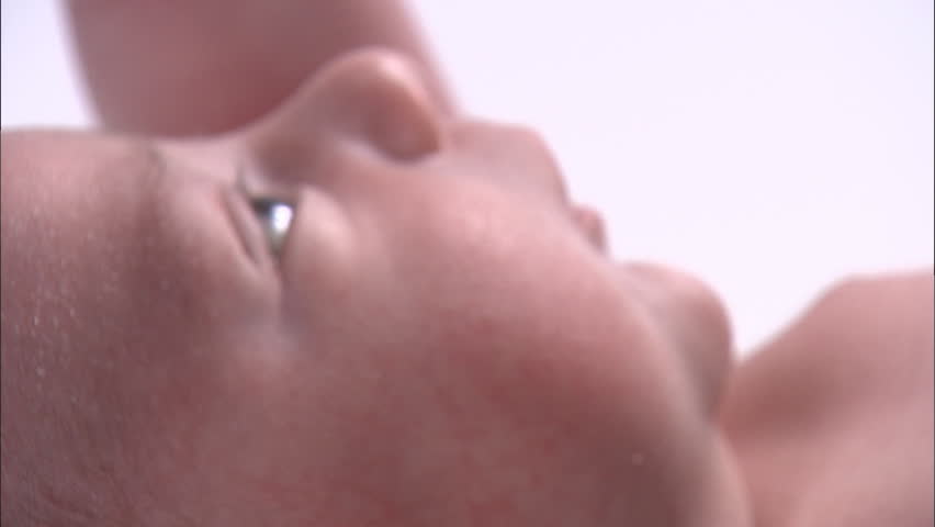 Closeup of newborn baby's face, right side 2