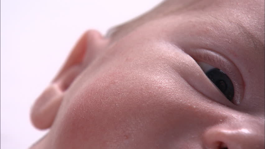 Closeup of newborn baby's face, right side