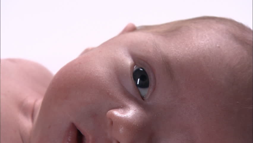 Closeup of newborn baby's upper body