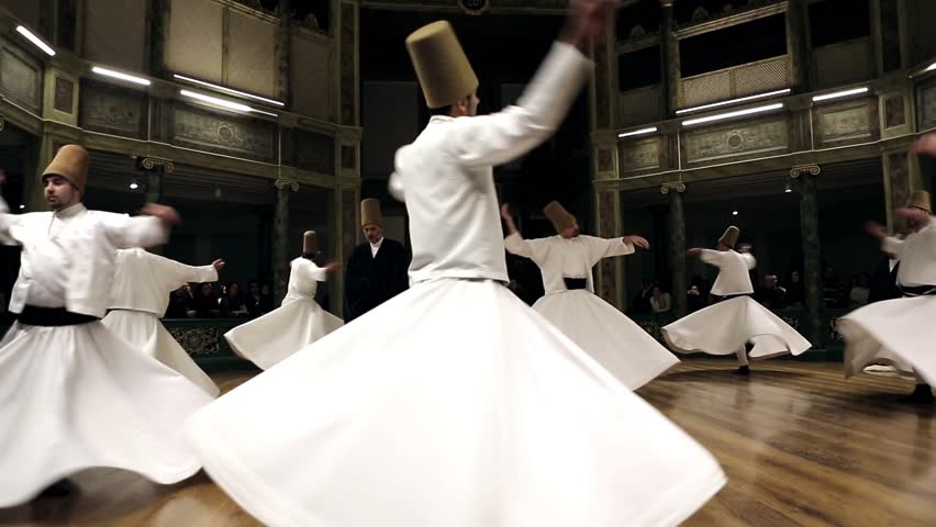 ISTANBUL, TURKEY - DECEMBER 17: Sufi whirling dervish (Semazen) dances on December 17, 2013 in Istanbul, Turkey. Royalty-Free Stock Footage #21832048