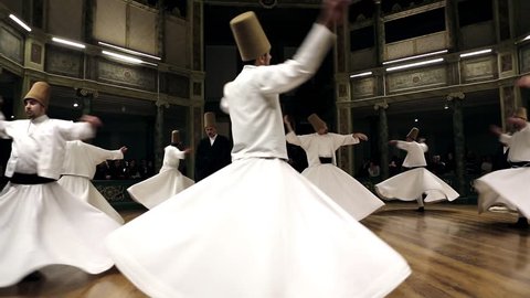ISTANBUL, TURKEY - DECEMBER 17: Sufi whirling dervish (Semazen) dances on December 17, 2013 in Istanbul, Turkey.