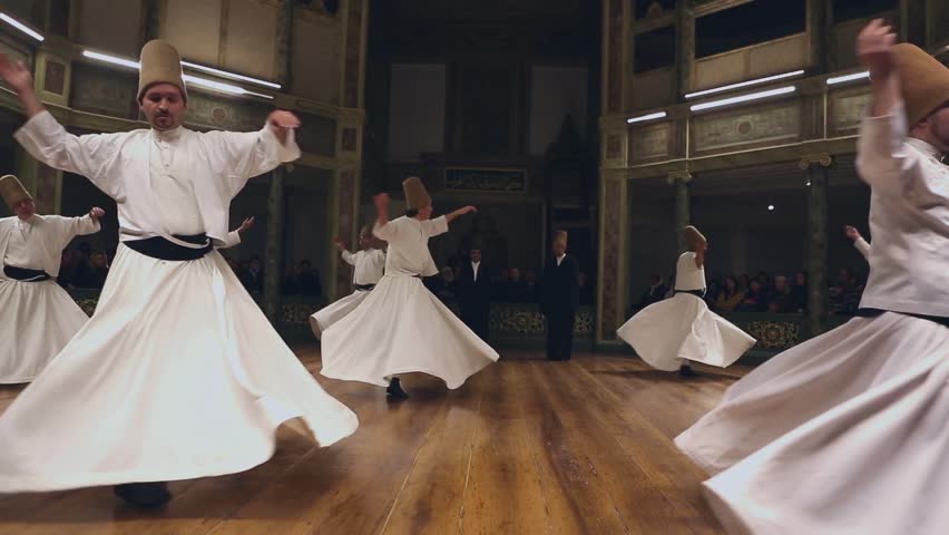 ISTANBUL, TURKEY - DECEMBER 17: Sufi whirling dervish (Semazen) dances on December 17, 2013 in Istanbul, Turkey. Royalty-Free Stock Footage #21832051