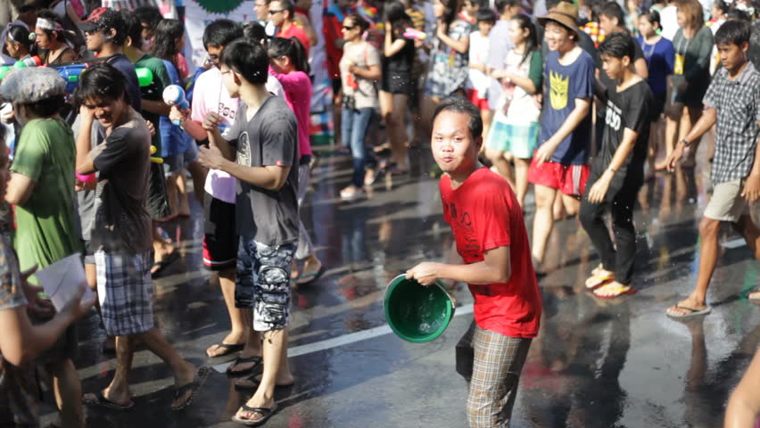 BANGKOK - APRIL 14, 2012: Thai people are celebrating Songkran Water Festival at