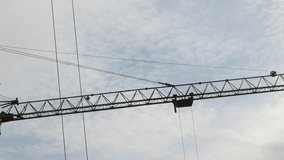construction crane against cloudy blue sky - Powered by Shutterstock - Get 15% off with code: PIKWIZARD15