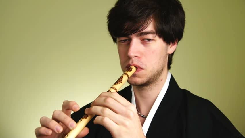Flutist plays the flute.