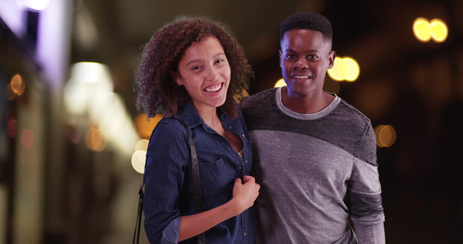 Millennial black man and woman pose for a portrait while waiting for the train. Young black couple wait foot the train to come. 4k. | Shutterstock HD Video #21847492
