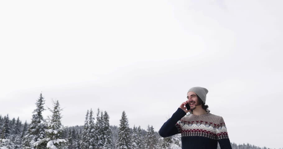 Man Winter Snow Forest Walk Young Guy Call Smart Phone Happy Smile Slow Motion 60