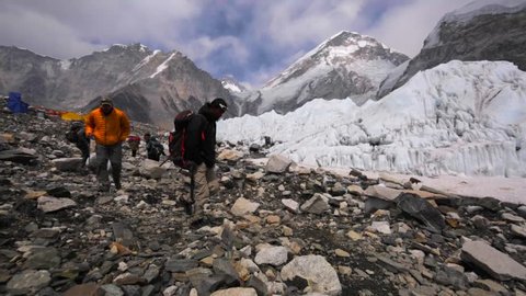 EVEREST BASE CAMP, NEPAL - APRIL 30, 2016: Walking trekkers in Everest base camp established on Khumbu Icefall for tourists' convenience